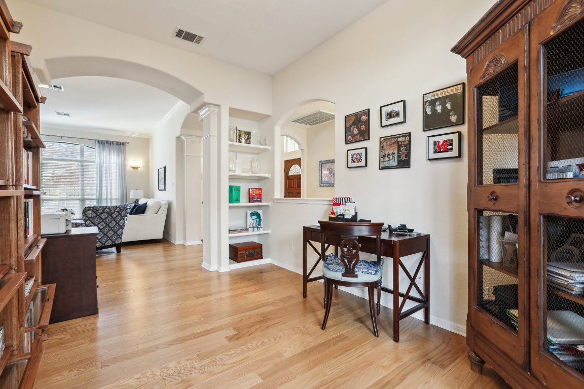 3805 Pebble Court Round Rock, TX 78664 - Photo 6 of 31 a living room with furniture and wooden floor