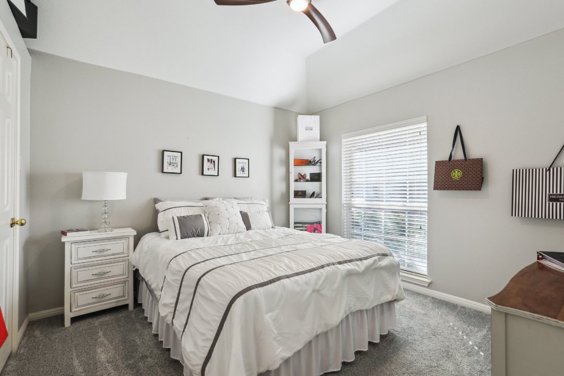 3805 Pebble Court Round Rock, TX 78664 - Photo 7 of 31 a bedroom with a bed and a night stand