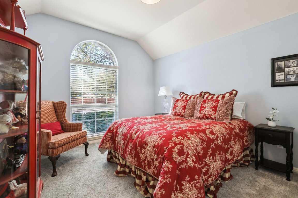 3805 Pebble Court Round Rock, TX 78664 - Photo 8 of 31 a bedroom with a bed chair and a window