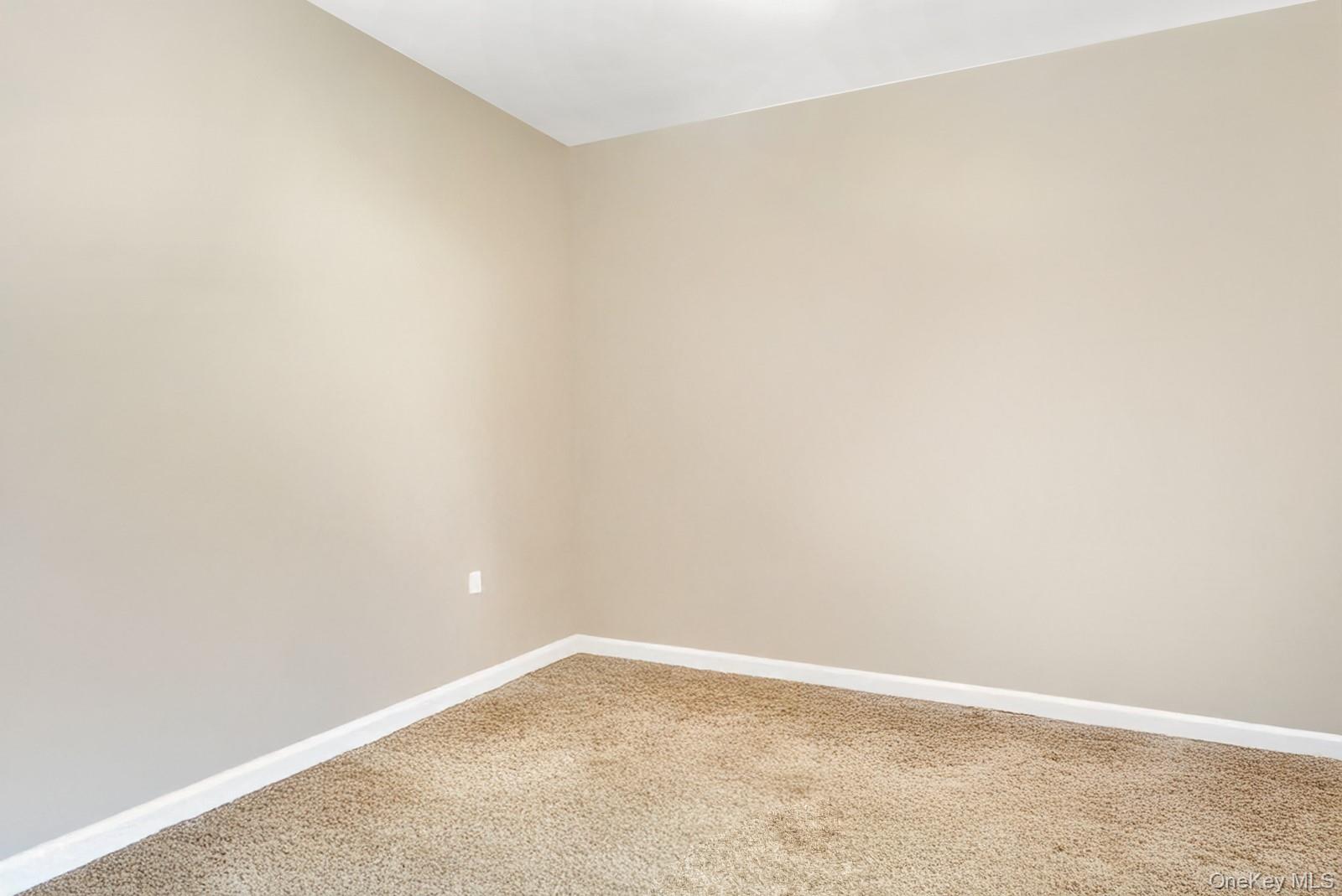 60-56 75th Street Queens, NY 11379 - Photo 5 of 30 a view of an empty room