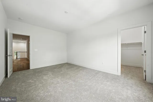 an empty room with a bathroom