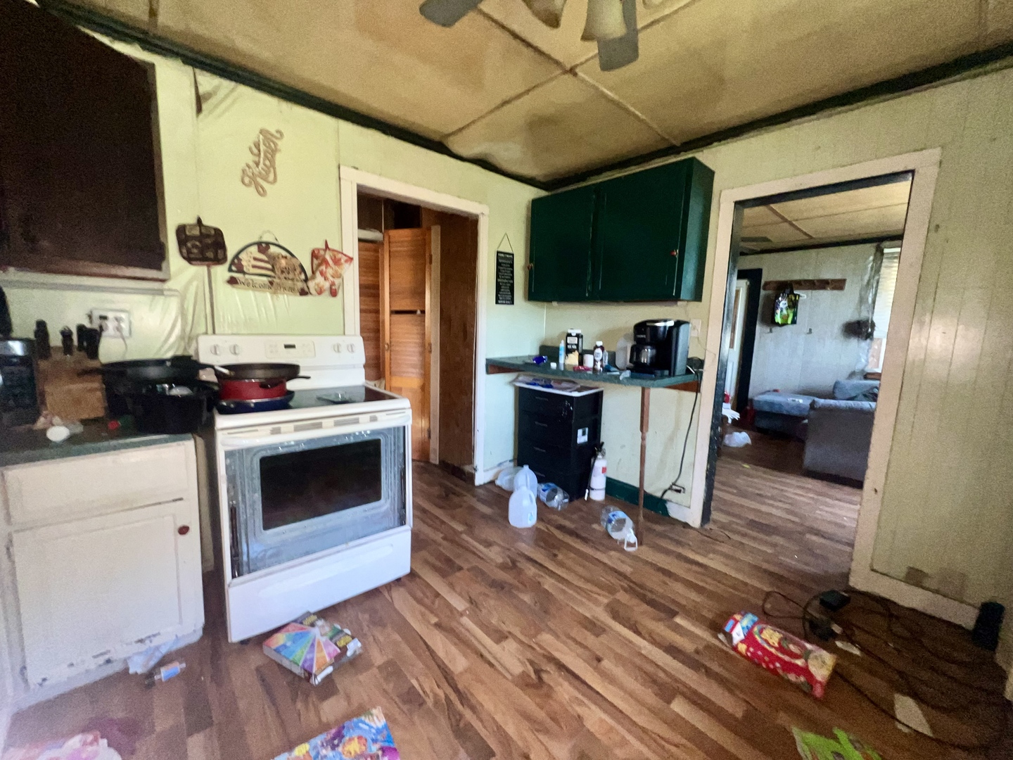 13174 Harrold Point Road Wapella, IL 61777 - Photo 12 of 23 a kitchen view of a stove and a refrigerator