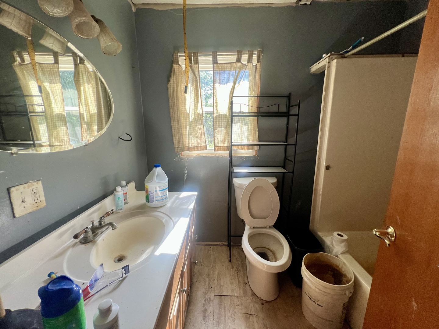 13174 Harrold Point Road Wapella, IL 61777 - Photo 19 of 23 a bathroom with a toilet sink and mirror