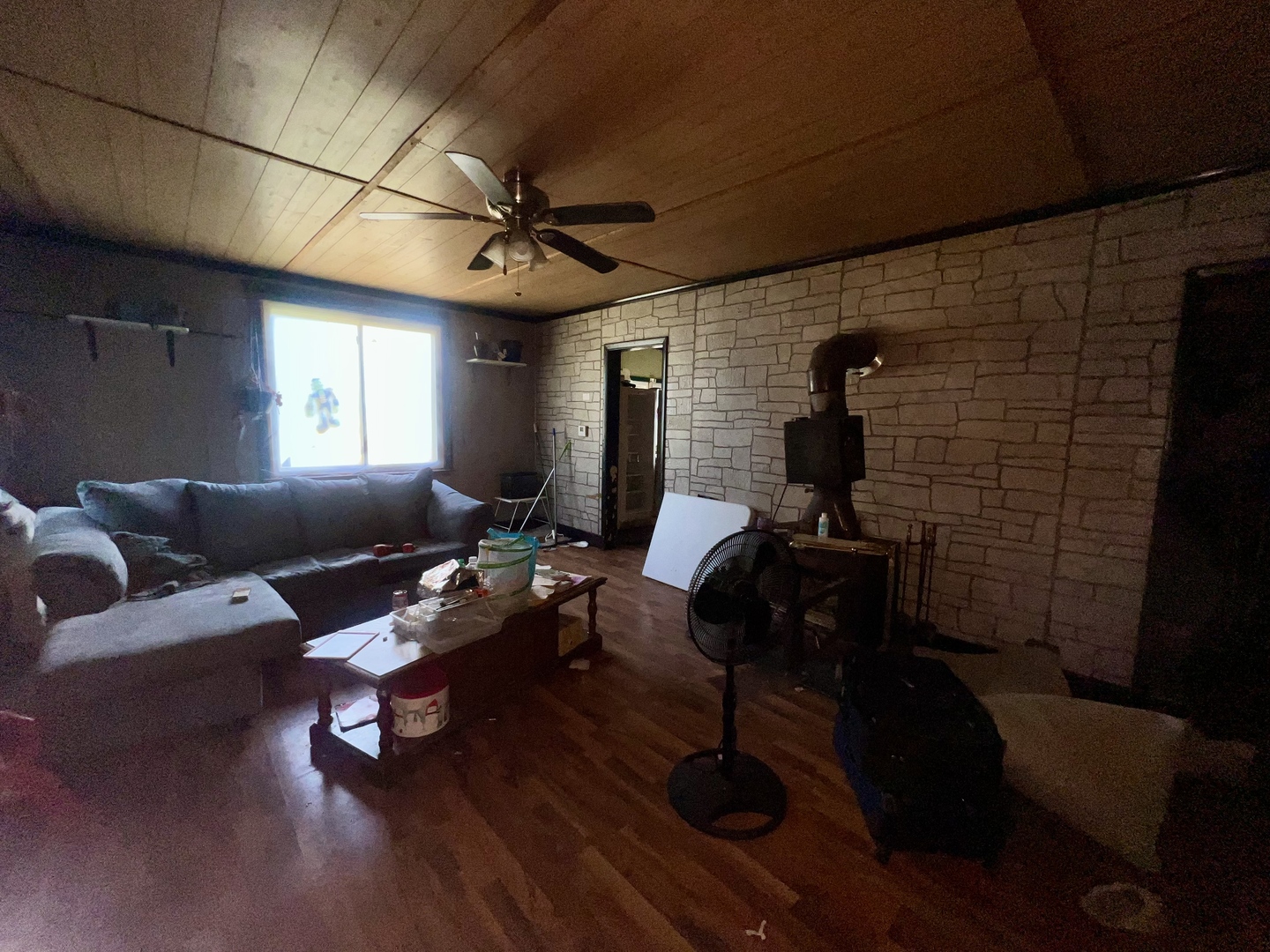 13174 Harrold Point Road Wapella, IL 61777 - Photo 6 of 23 a living room with furniture and wooden floor