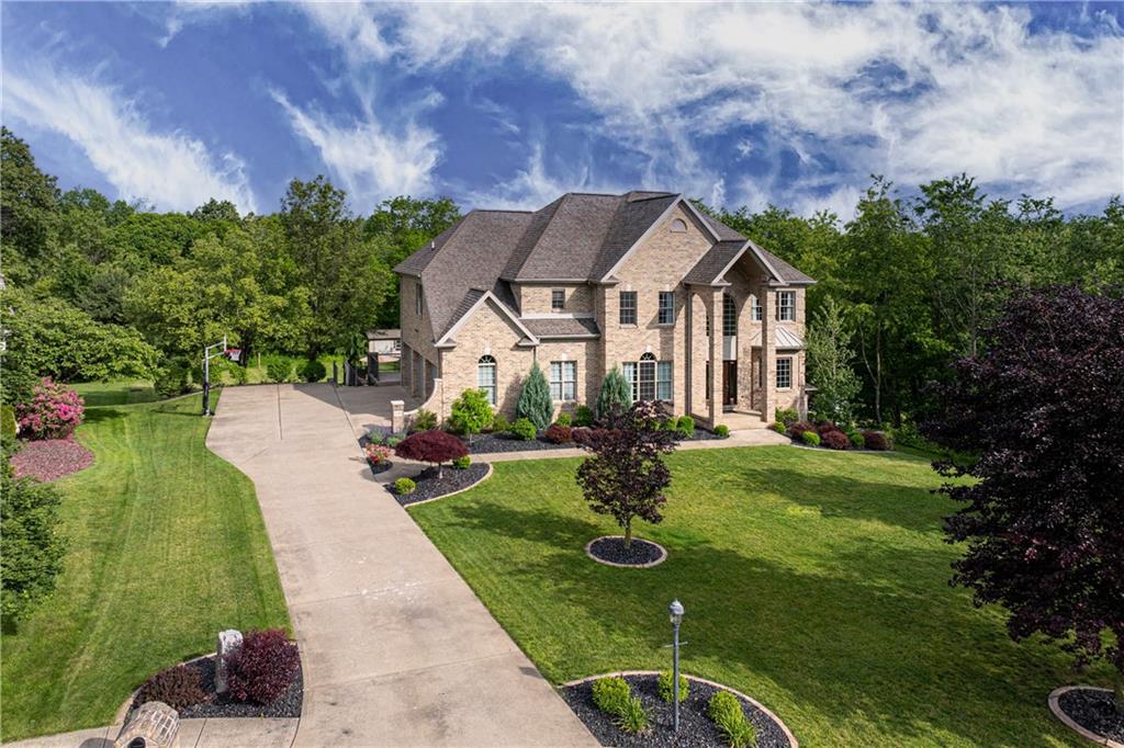 110 Marcur Lane Monaca, PA 15061 - Photo 1 of 50 a front view of a house with garden