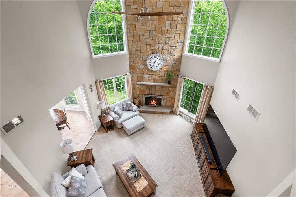 110 Marcur Lane Monaca, PA 15061 - Photo 12 of 50 a living room with furniture and a fireplace