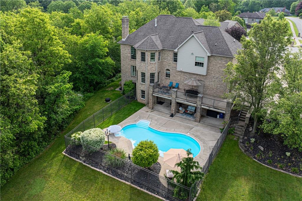 110 Marcur Lane Monaca, PA 15061 - Photo 2 of 50 an aerial view of a house with swimming pool a yard and outdoor seating
