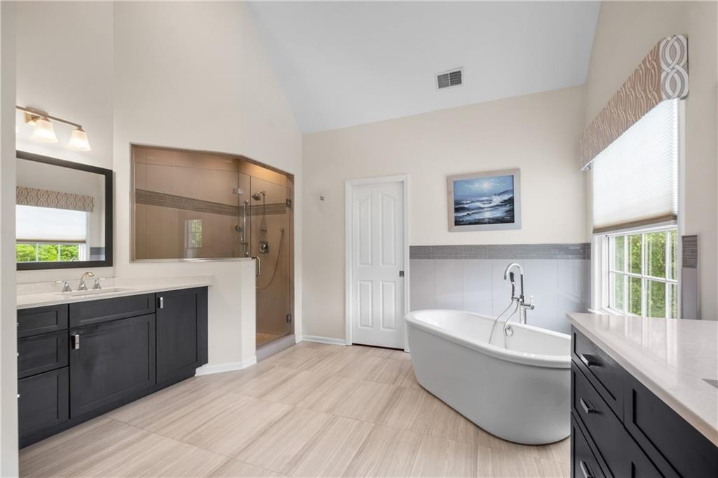 110 Marcur Lane Monaca, PA 15061 - Photo 28 of 50 a bathroom with a tub sink shower and mirror