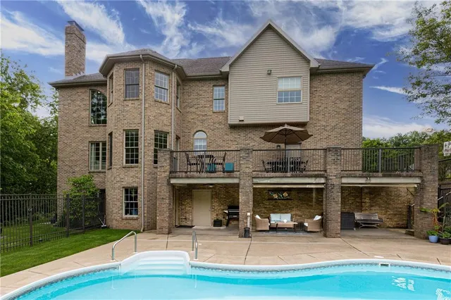 a front view of a house with yard