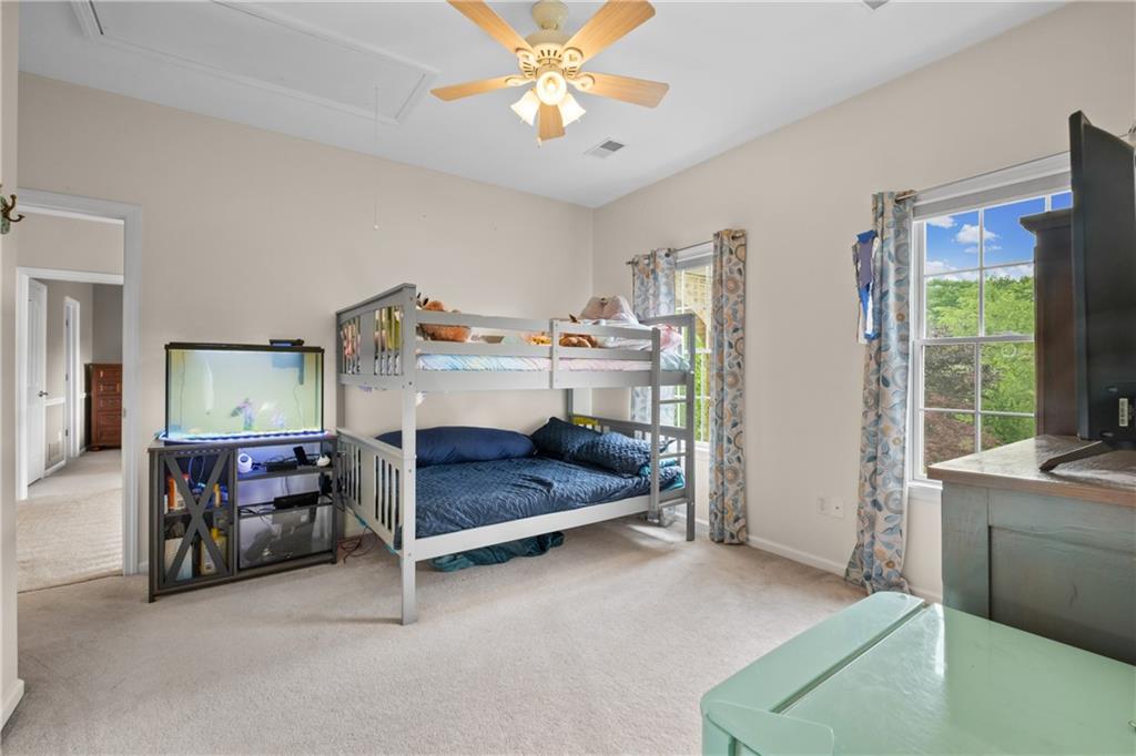 110 Marcur Lane Monaca, PA 15061 - Photo 32 of 50 a bedroom with a bed and a chandelier