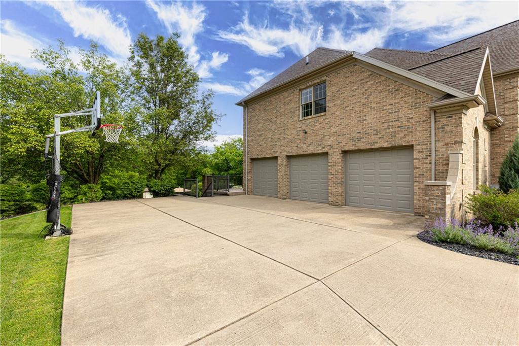 110 Marcur Lane Monaca, PA 15061 - Photo 44 of 50 a front view of a house with a yard and garage