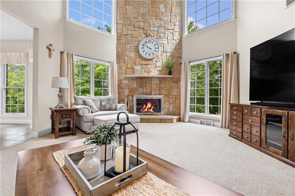 110 Marcur Lane Monaca, PA 15061 - Photo 9 of 50 a living room with fireplace furniture and a flat screen tv