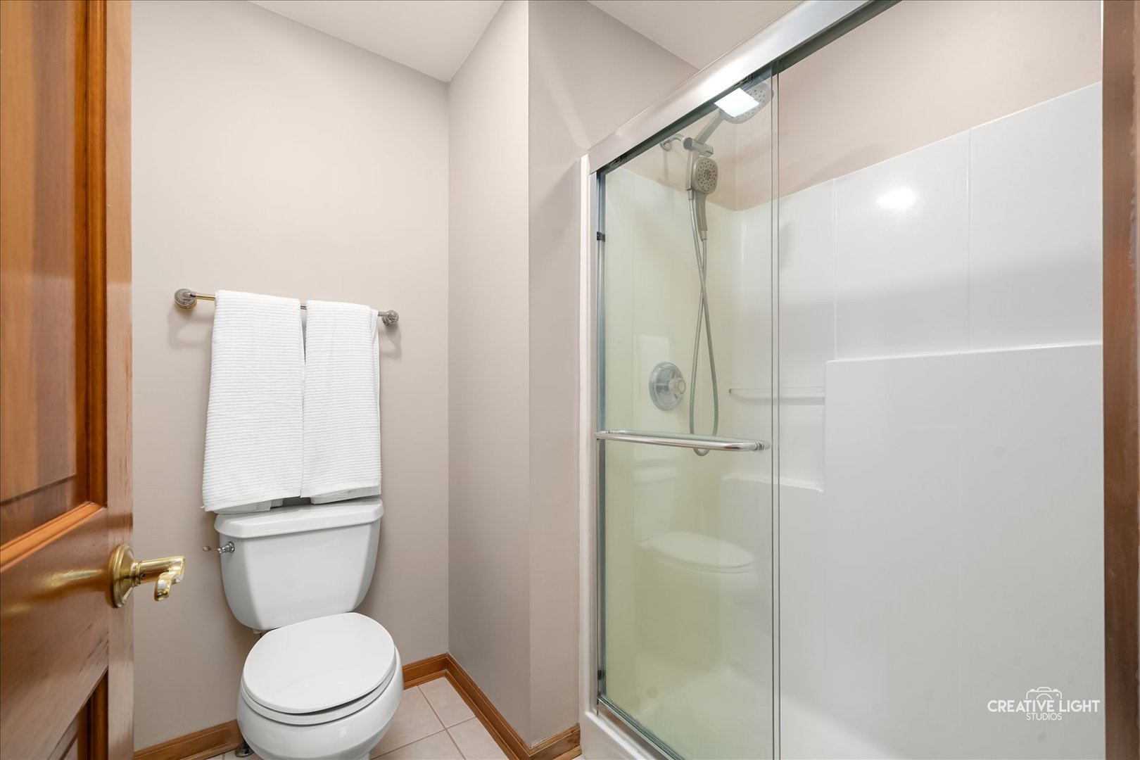 201 Violet Lane Batavia, IL 60510 - Photo 25 of 47 a bathroom with a toilet and a shower