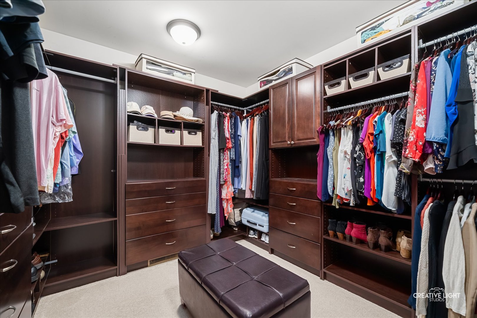 201 Violet Lane Batavia, IL 60510 - Photo 26 of 47 a view of walk in closet with clothes and shoes