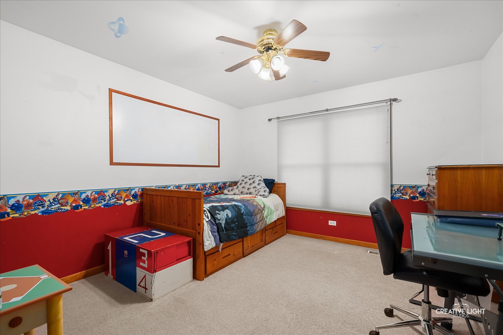 201 Violet Lane Batavia, IL 60510 - Photo 29 of 47 a bedroom with a bed and a chandelier