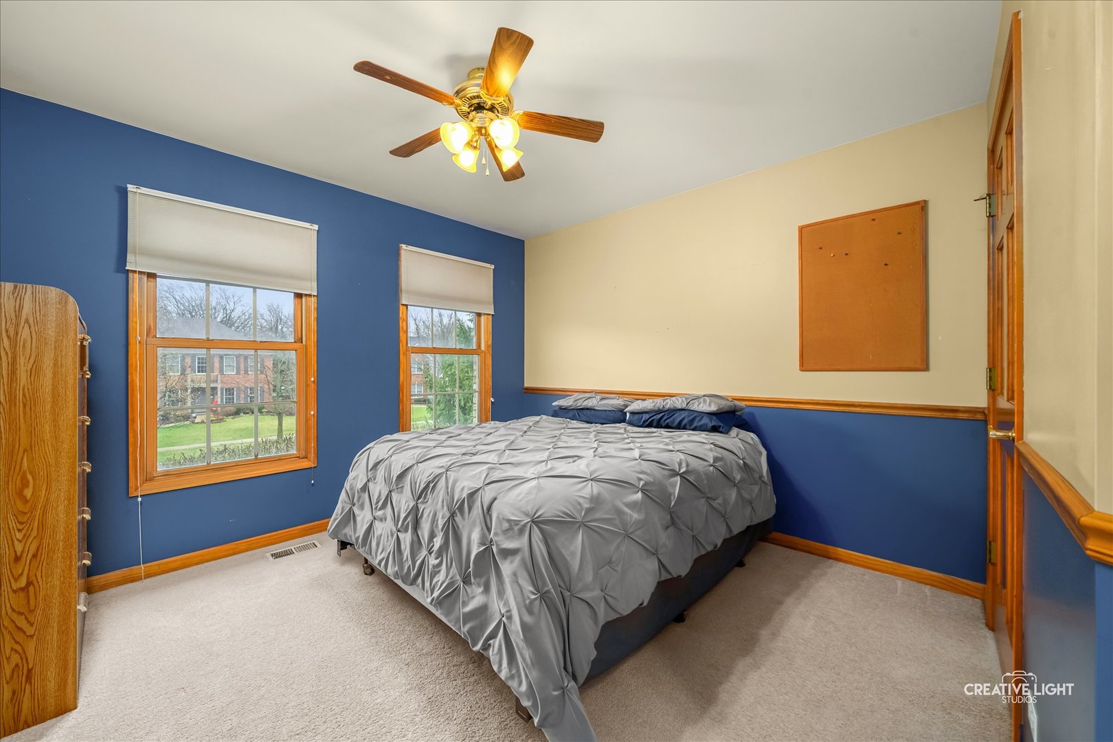 201 Violet Lane Batavia, IL 60510 - Photo 31 of 47 a bed sitting in a spacious bedroom next to a window