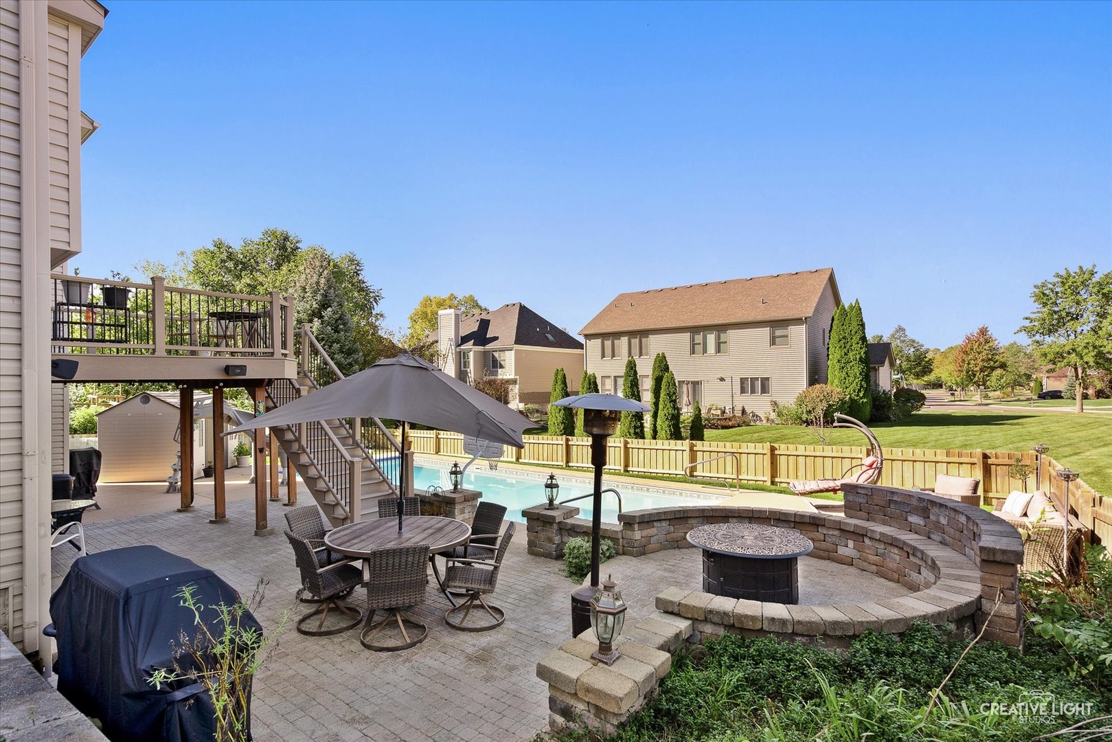 201 Violet Lane Batavia, IL 60510 - Photo 4 of 47 a view of swimming pool with outdoor seating and city view