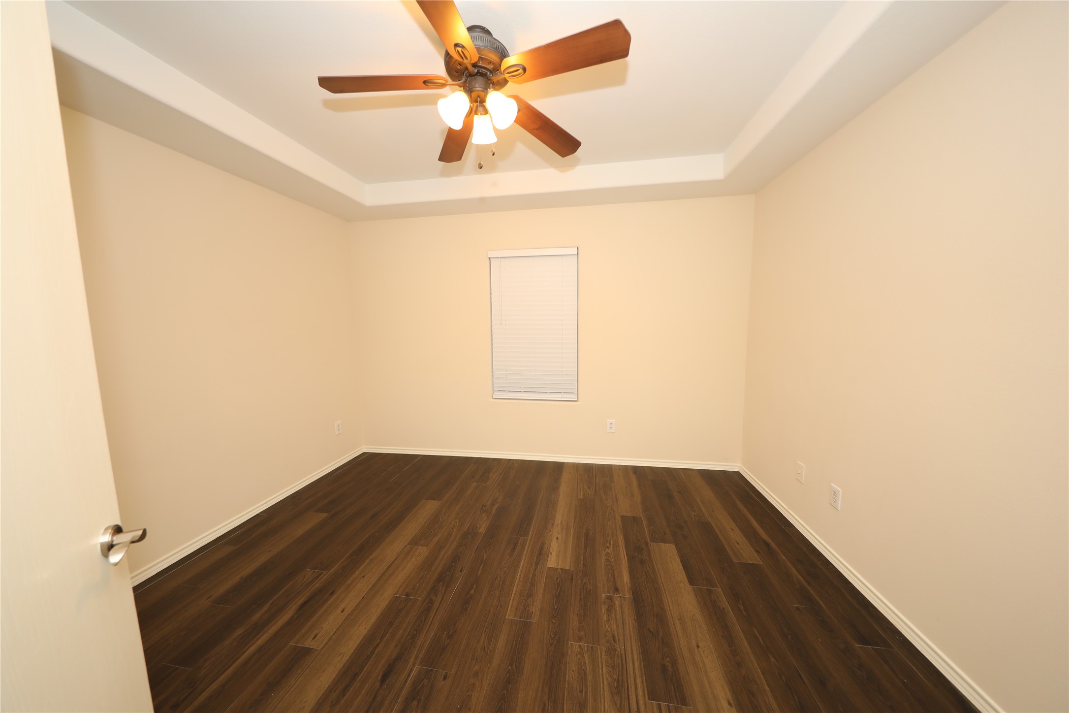 12620 Rio Bravo Street Rosharon, TX 77583 - Photo 14 of 25 an empty room with a window and a ceiling fan