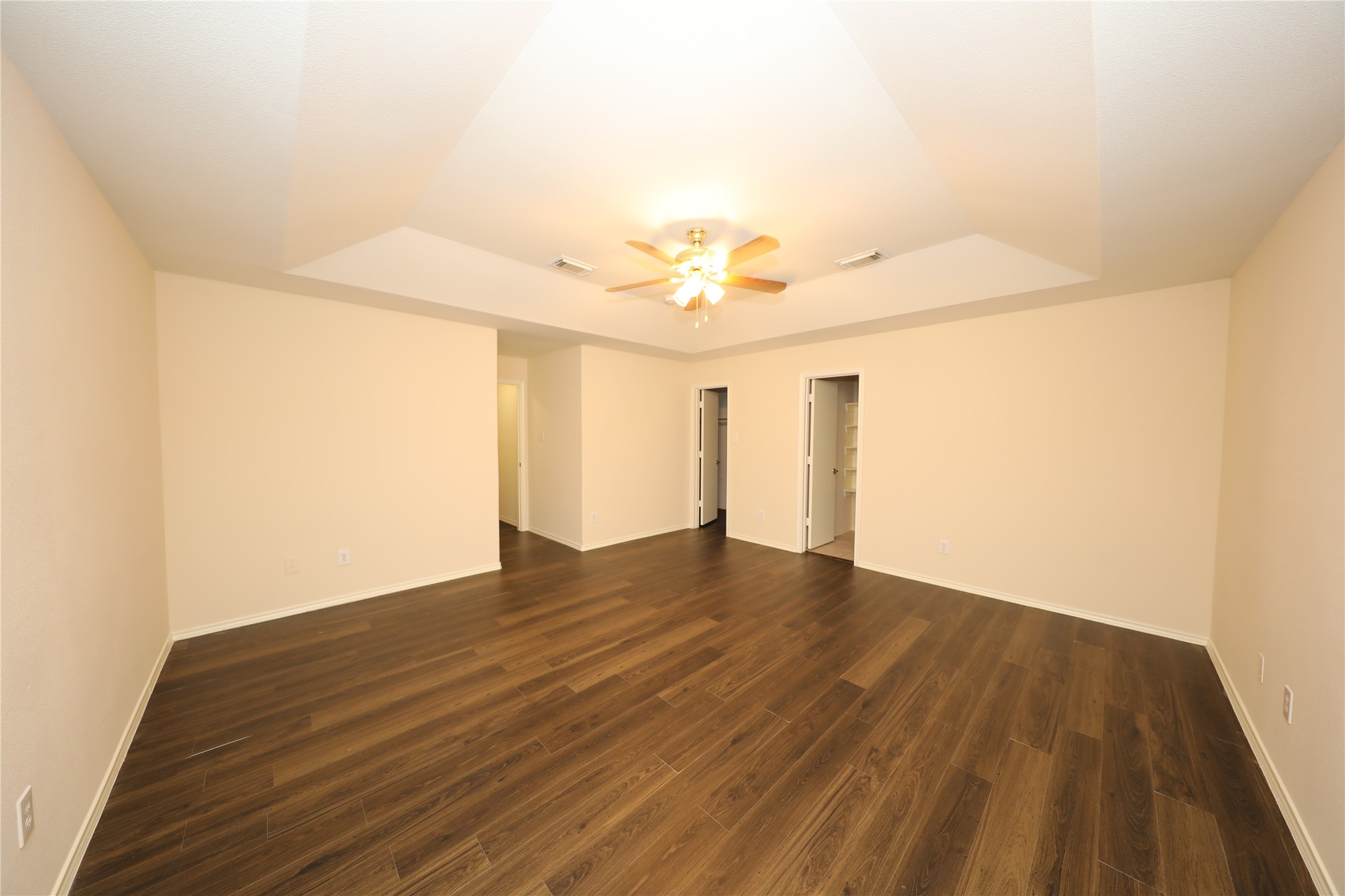 12620 Rio Bravo Street Rosharon, TX 77583 - Photo 18 of 25 a view of empty room with wooden floor