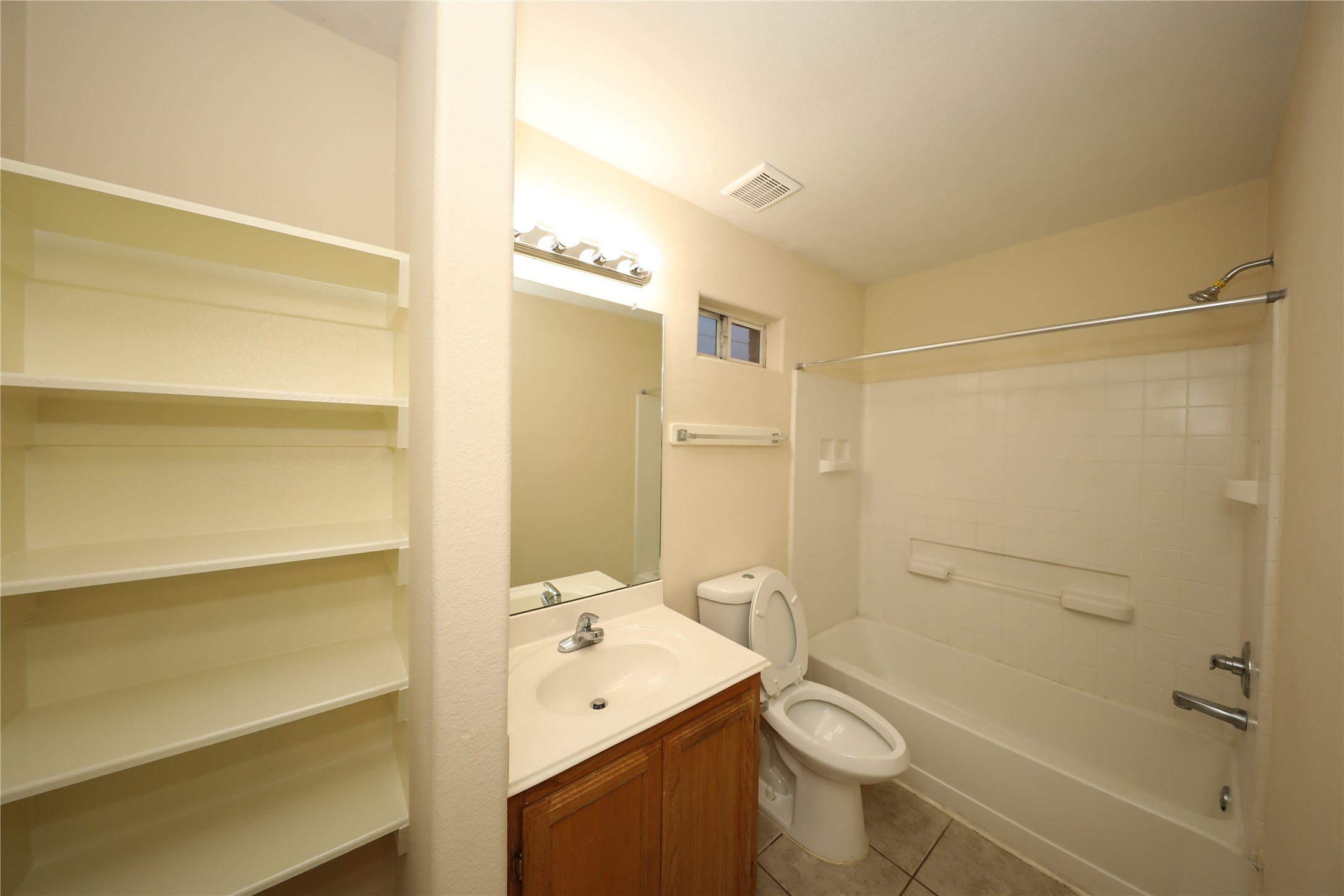 12620 Rio Bravo Street Rosharon, TX 77583 - Photo 19 of 25 a bathroom with a sink a toilet and shower