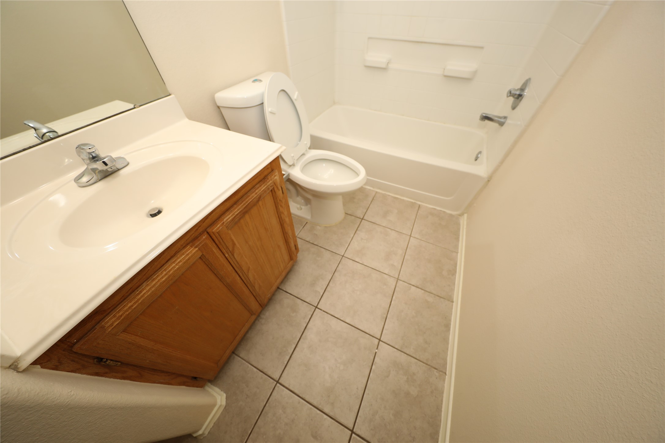 12620 Rio Bravo Street Rosharon, TX 77583 - Photo 20 of 25 a bathroom with a sink and a mirror