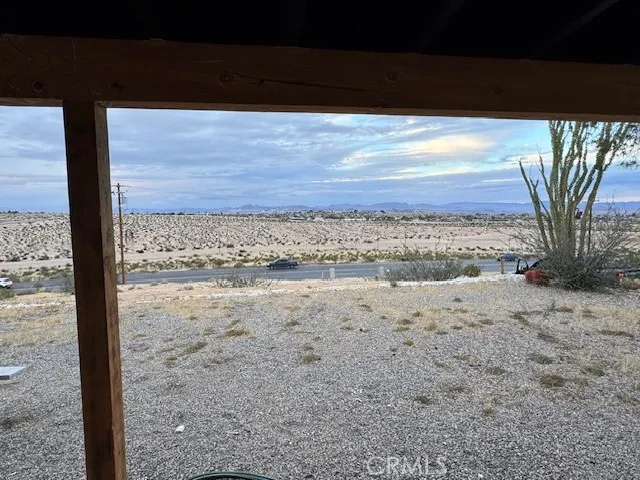 a view of a backyard of the house