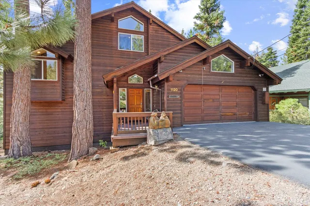 a front view of a house with a garage