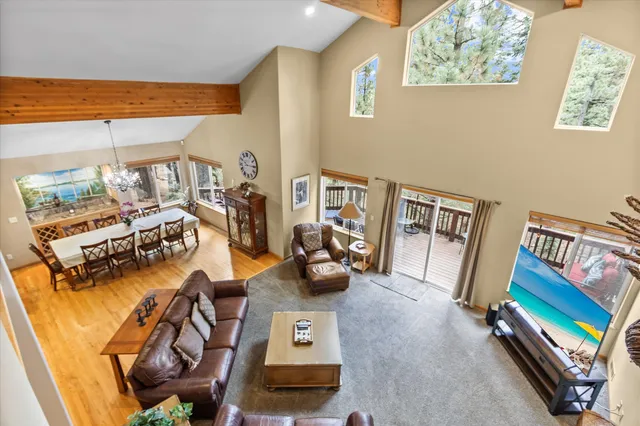 a room with furniture and a large window