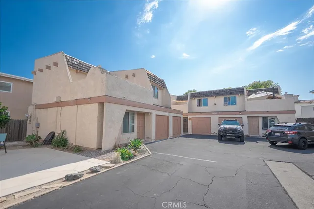 a view of a street with houses