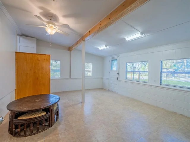 a room with furniture and a window