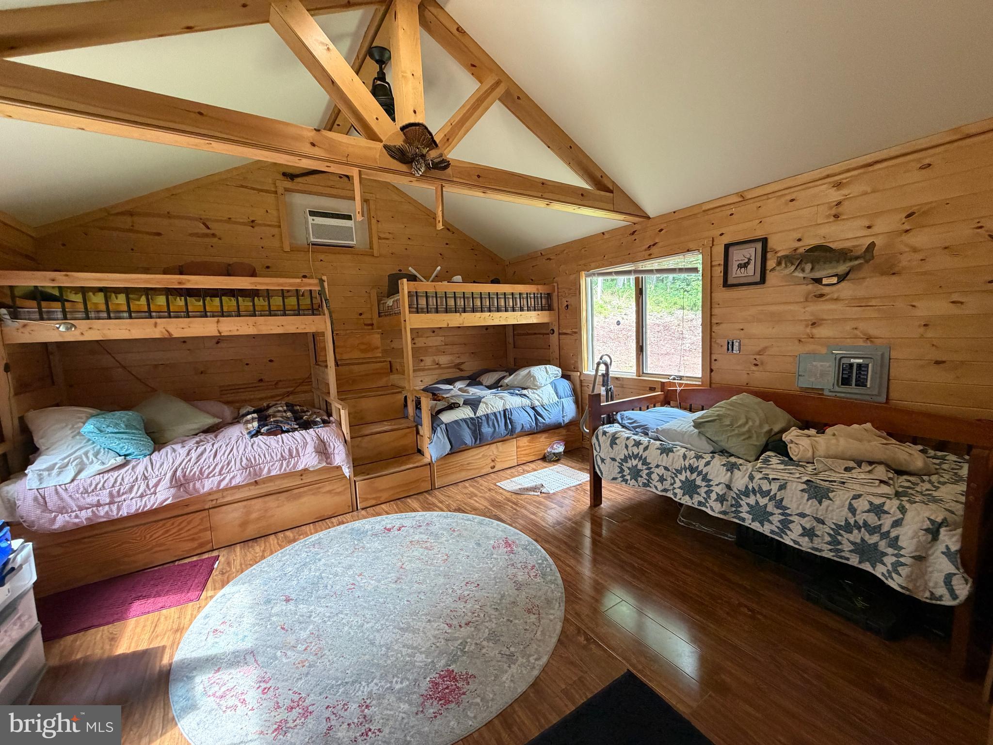 1419 Paul's Woods Road Delray, WV 26714 - Photo 28 of 105 a bedroom with furniture and a bed