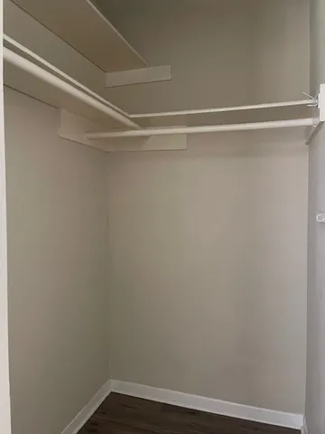 a view of a room with racks on the wall