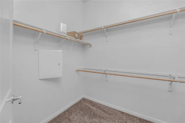 a view of a room with racks on the wall