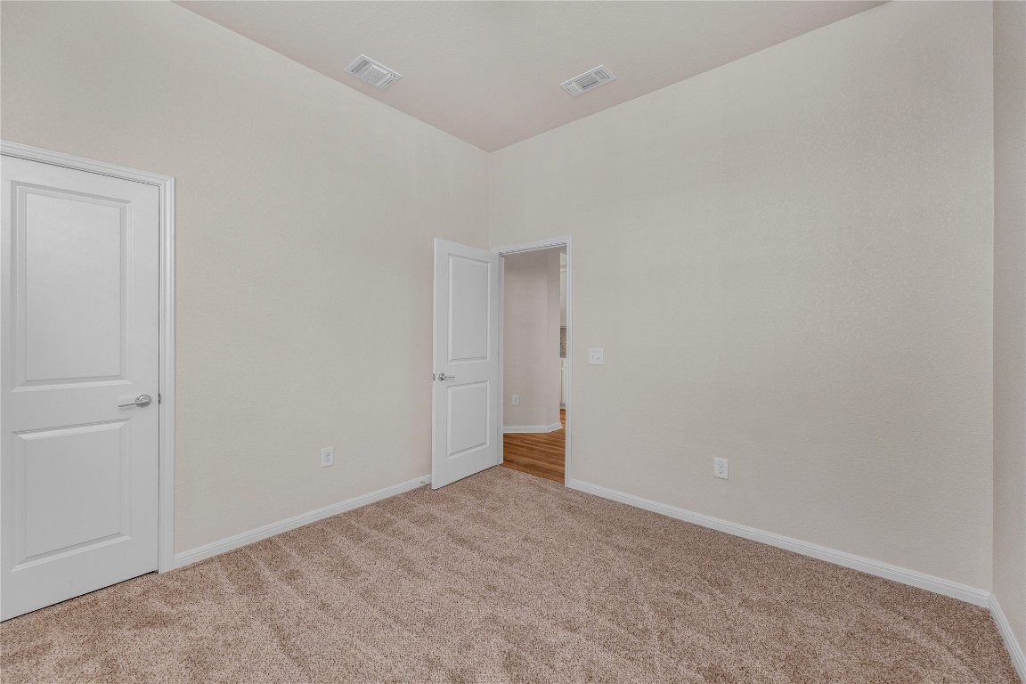 9941 Comely Bend Manor, TX 78653 - Photo 21 of 31 a view of an empty room