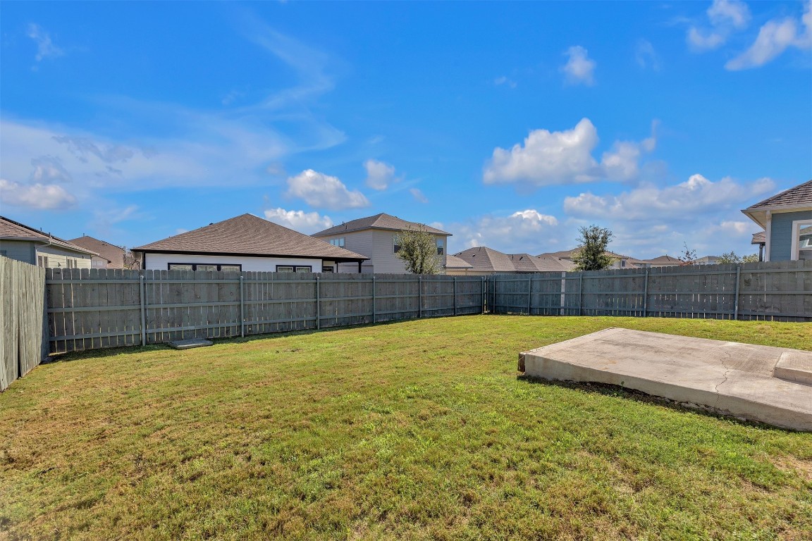 9941 Comely Bend Manor, TX 78653 - Photo 30 of 31 a view of a backyard