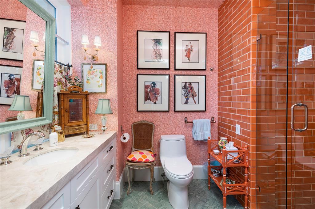 13230 Miller Road Azle, TX 76020 - Photo 19 of 37 a bathroom with a granite countertop toilet sink and mirror