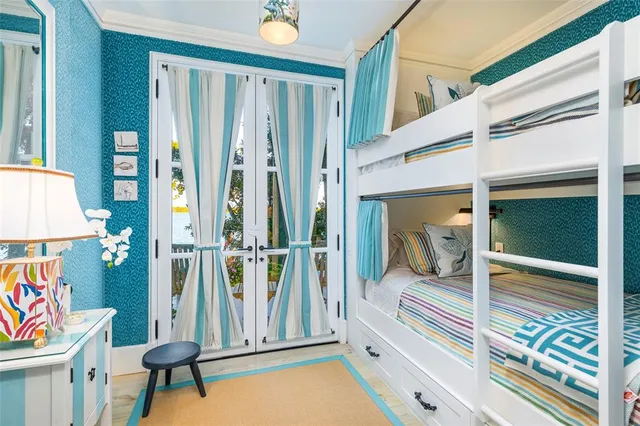 a view of an entryway with wooden floor and door