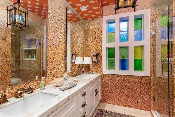 a bedroom with bed and window