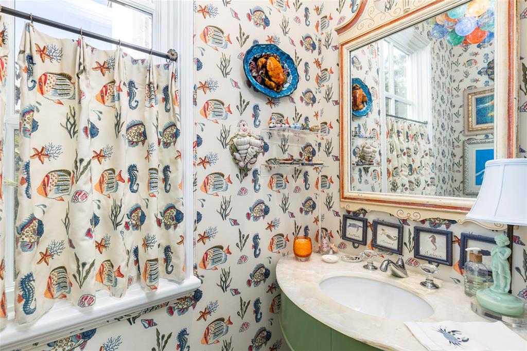 13230 Miller Road Azle, TX 76020 - Photo 25 of 37 a bathroom with a sink and a mirror