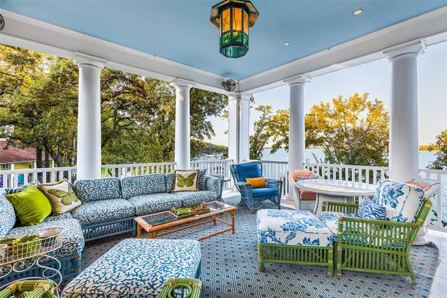 a living room with fireplace furniture and a flat screen tv