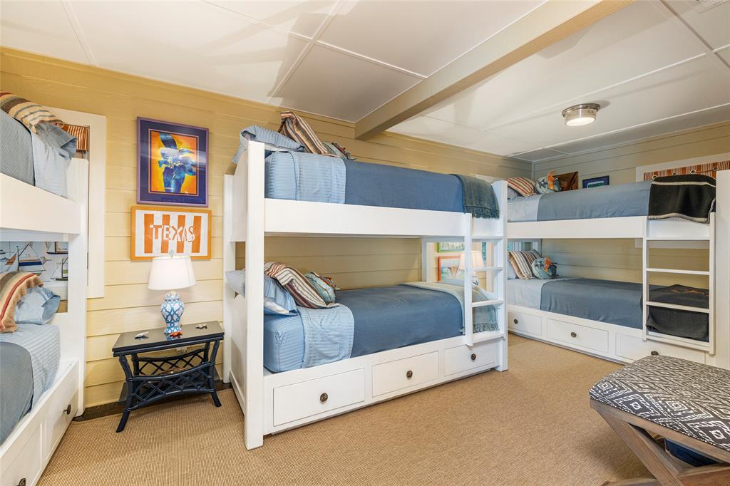 13230 Miller Road Azle, TX 76020 - Photo 30 of 37 a bedroom with a bed and a walk in closet