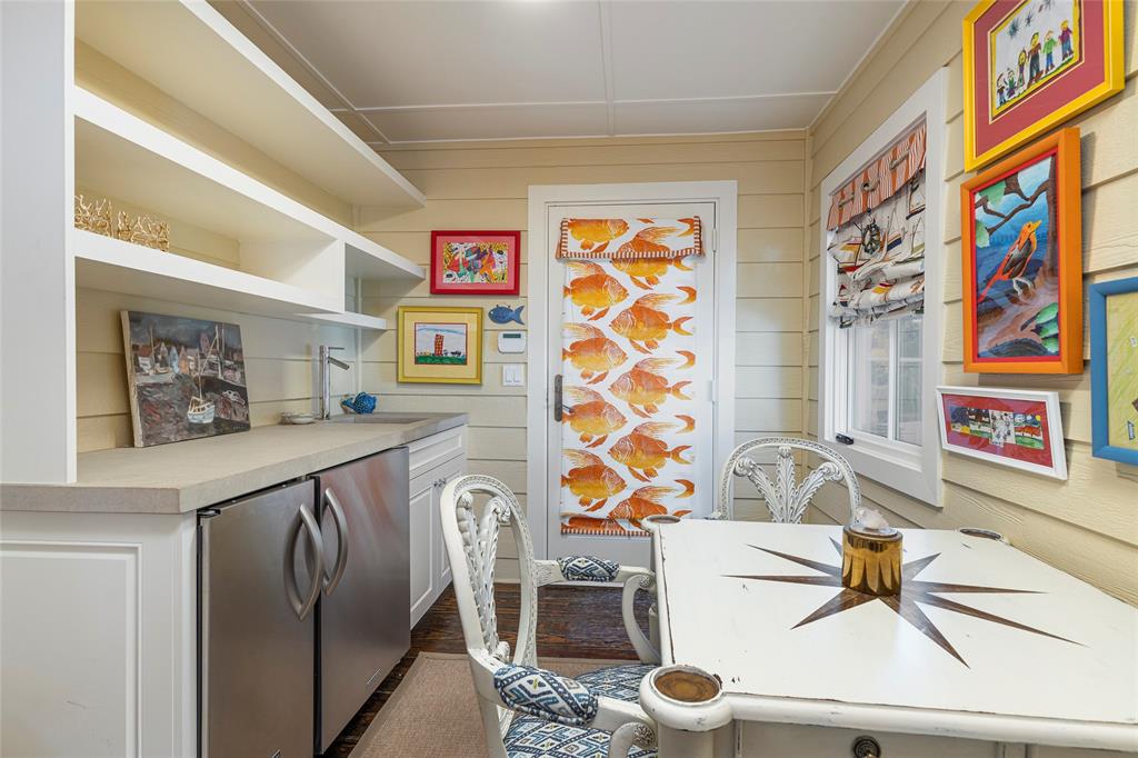 13230 Miller Road Azle, TX 76020 - Photo 31 of 37 a living room with stainless steel appliances furniture and a rug