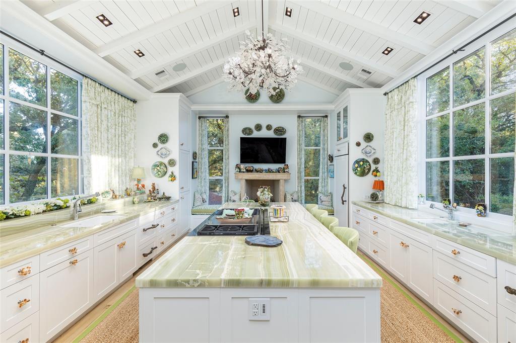 13230 Miller Road Azle, TX 76020 - Photo 7 of 37 a bathroom with a granite countertop sink a large mirror and a bathtub next to a window