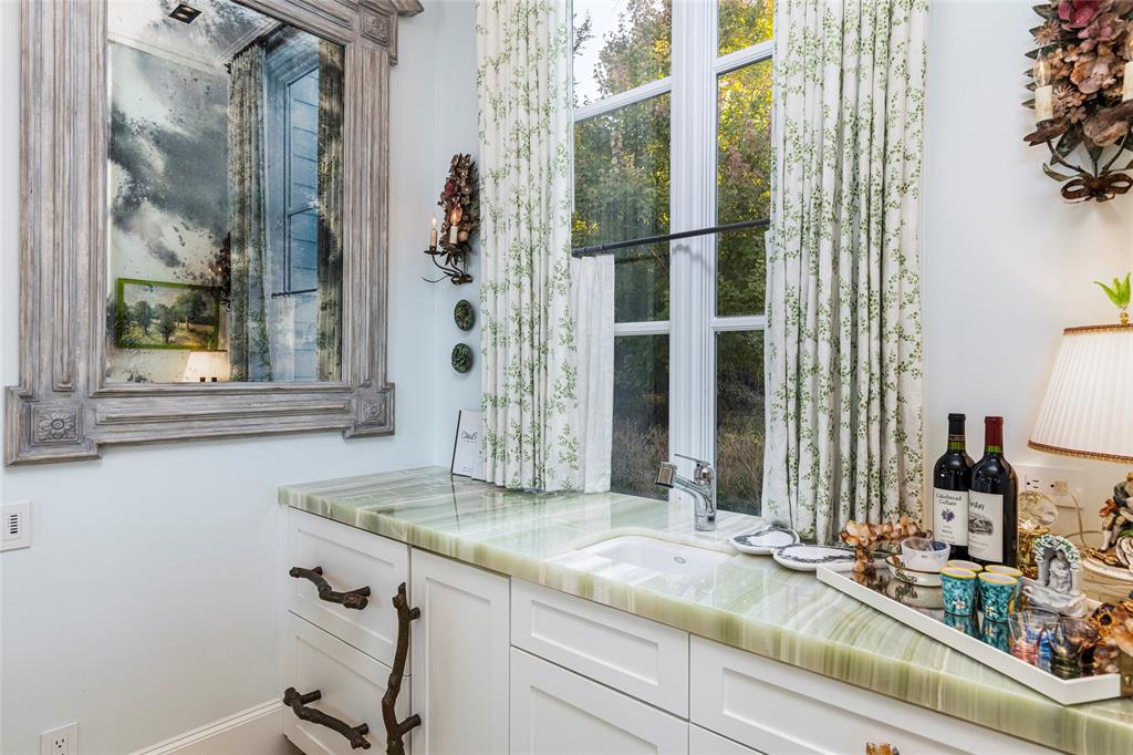 13230 Miller Road Azle, TX 76020 - Photo 8 of 37 a bathroom with a granite countertop sink and a mirror