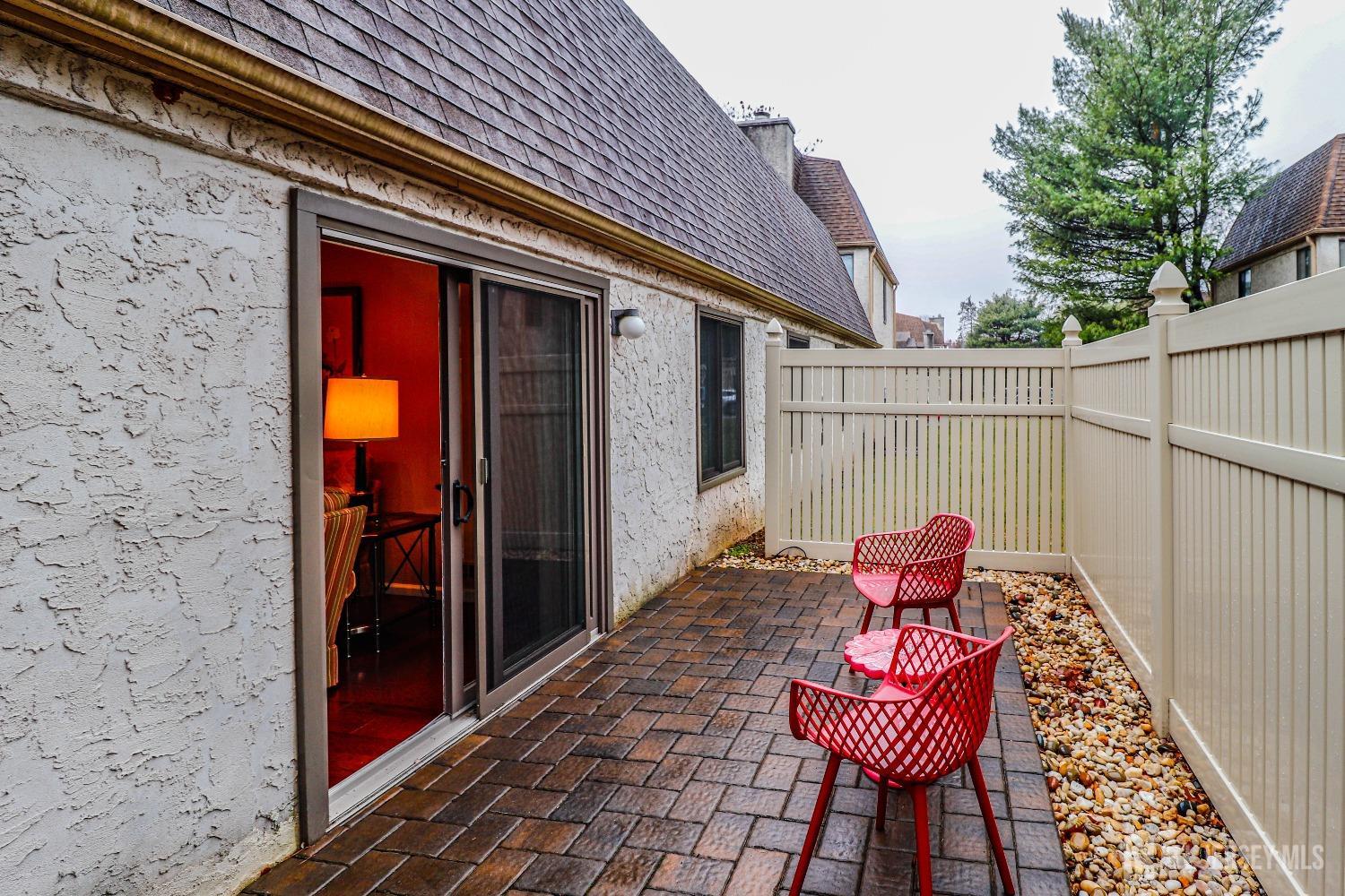 34 Park Gate Drive Edison, NJ 08820 - Photo 18 of 31 a patio with table and chairs