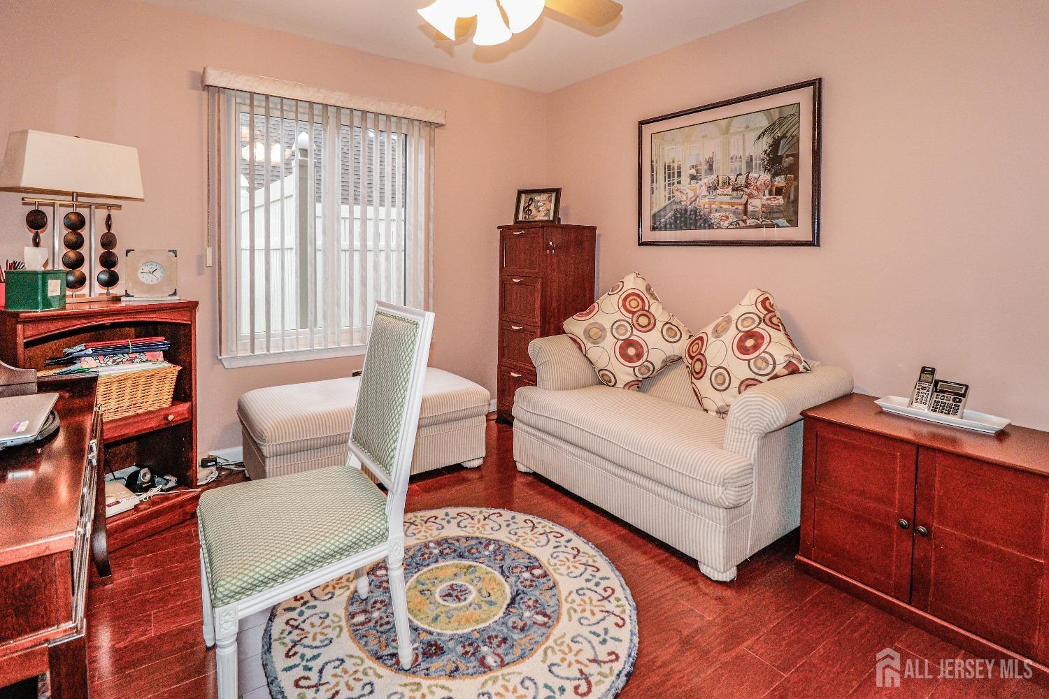 34 Park Gate Drive Edison, NJ 08820 - Photo 23 of 31 a bedroom with furniture and wooden floor