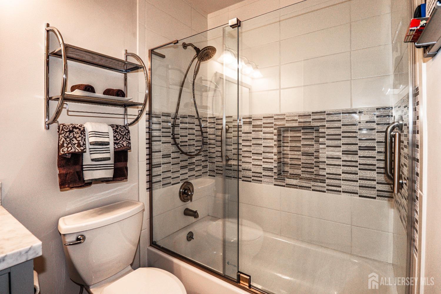 34 Park Gate Drive Edison, NJ 08820 - Photo 24 of 31 a bathroom with a shower a toilet and a sink