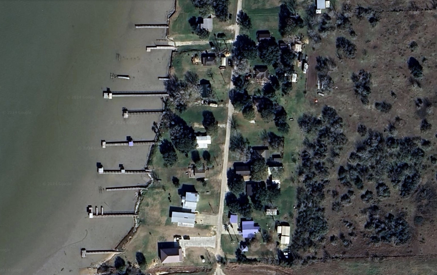 an aerial view of waterside residential houses