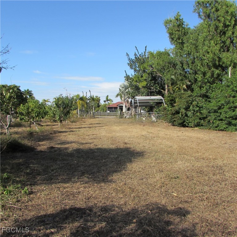 8390 Stringfellow Road St. James City, FL 33956 - Photo 15 of 25 a view of a yard