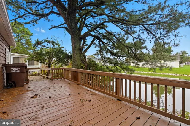 a view of deck with wooden floor and seating space